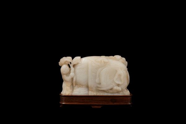 A WHITE STONE CARVING