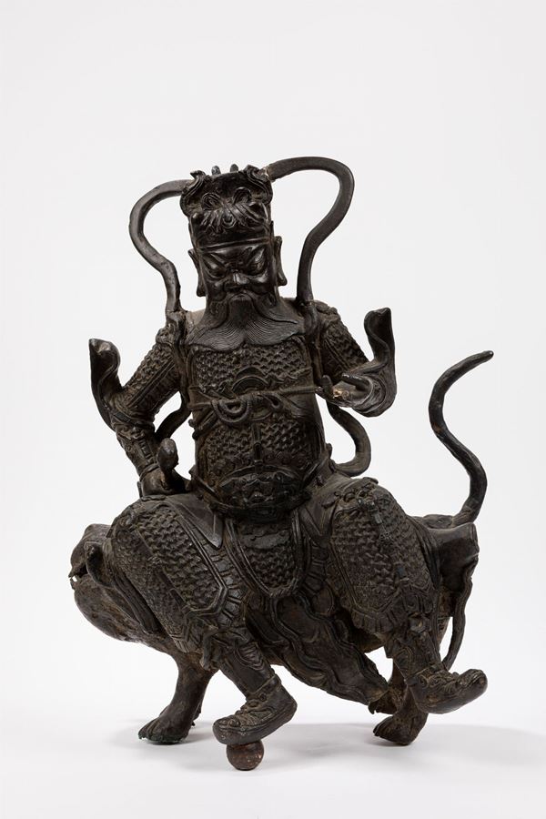 A LARGE BRONZE FIGURE