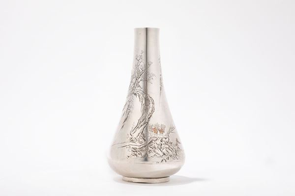 A SILVER VASE