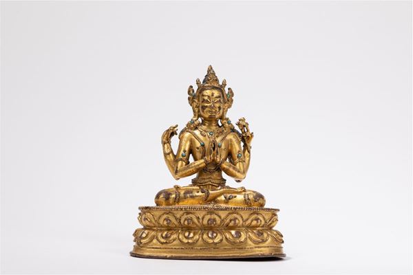 A GILT-BRONZE FIGURE OF AVALOKITESVARA