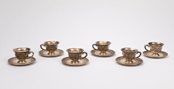 SIX SILVER CUP AND SAUCERS