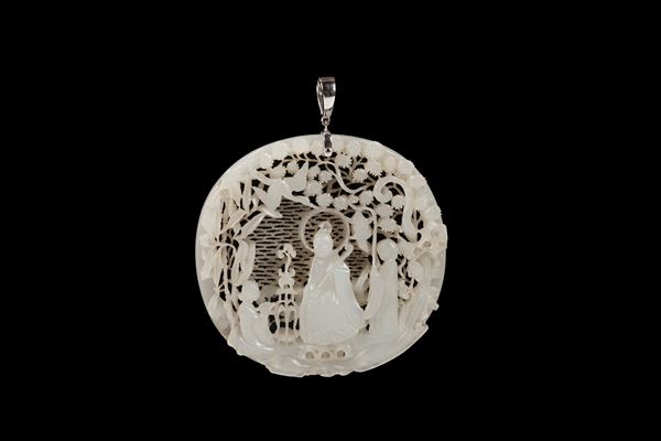 AN EXCEPTIONAL WHITE JADE OPENWORK FIGURAL PLAQUE
