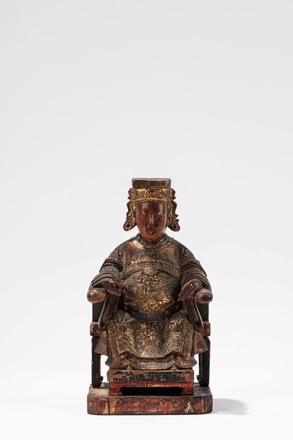 A GILT-LACQUERED WOOD FIGURE OF DIGNITARY