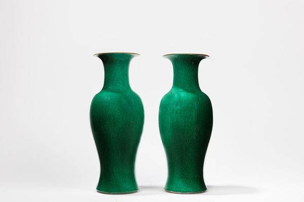 TWO APPLE GREEN PORCELAIN VASES