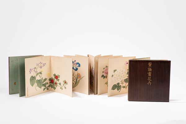 WOOD AND PAPER BOOK WITH PAINTINGS