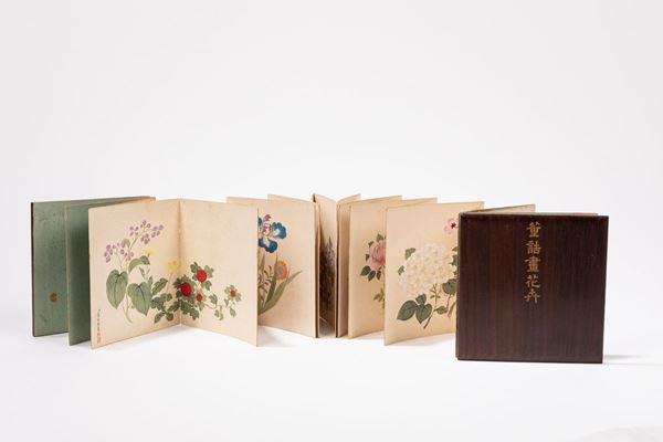 WOOD AND PAPER BOOK WITH PAINTINGS