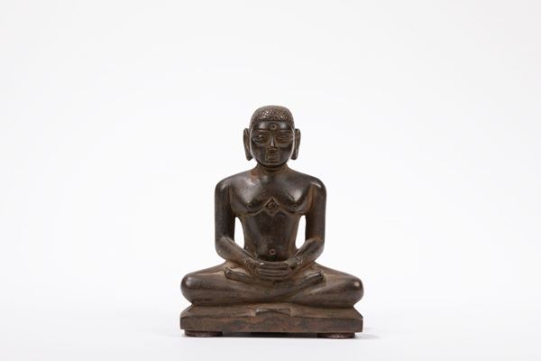 A BRONZE FIGURE