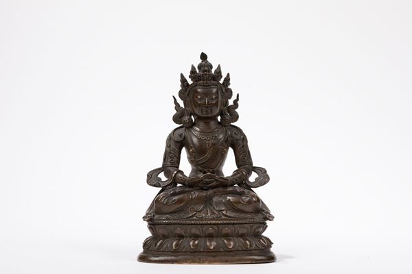 A BRONZE FIGURE OF A TARA