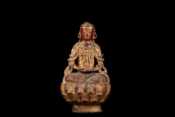 A GILT AND LACQUERED BRONZE SEATED FIGURE