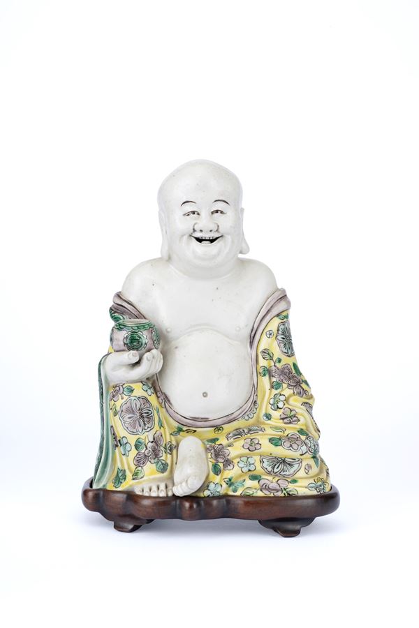 A FAMILLE VERTE PORCELAIN BUDDHA