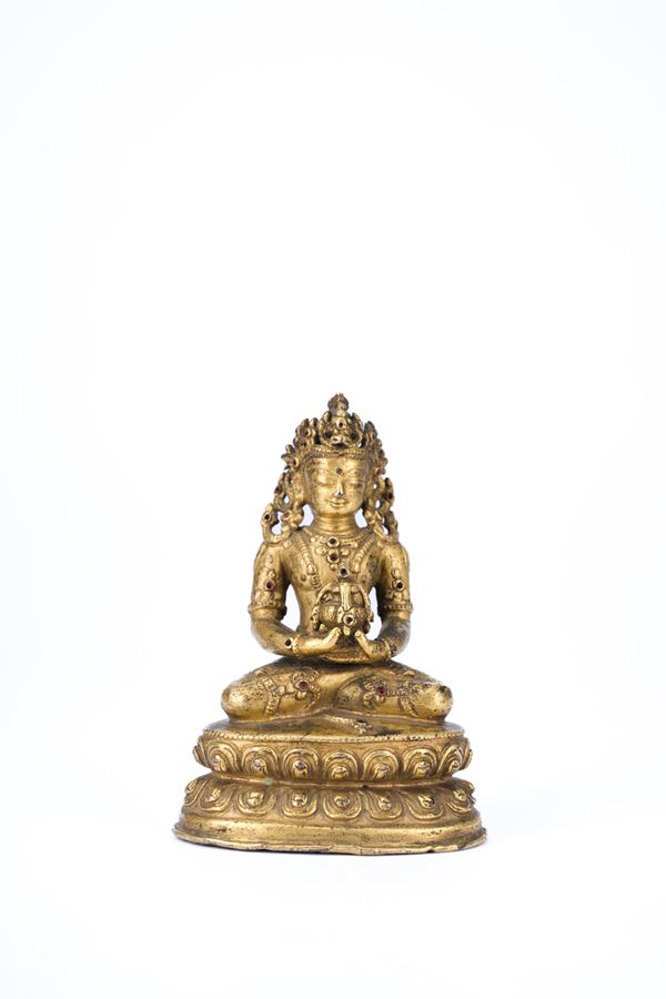 A SMALL GILT BRONZE FIGURE OF AMITAYUS