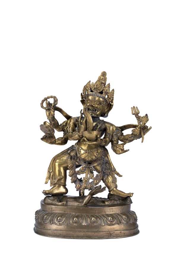 A RARE GILT-BRONZE FIGURE OF MAHAKALA