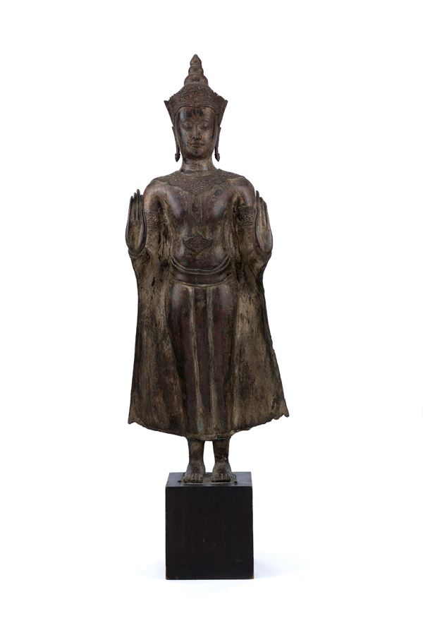 A BRONZE FIGURE