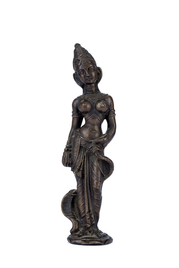 A BRONZE FIGURE