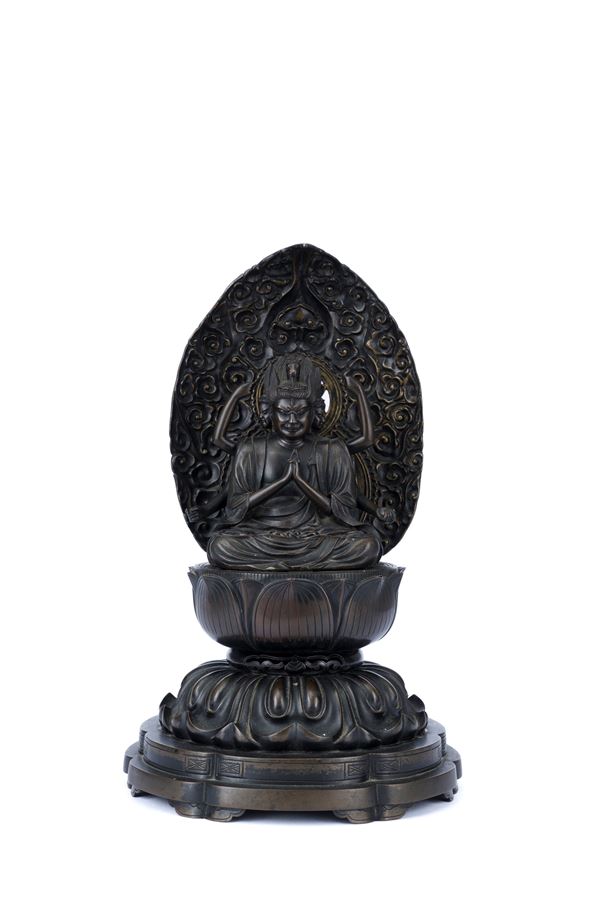 A BRONZE FIGURE OF BUDDHA