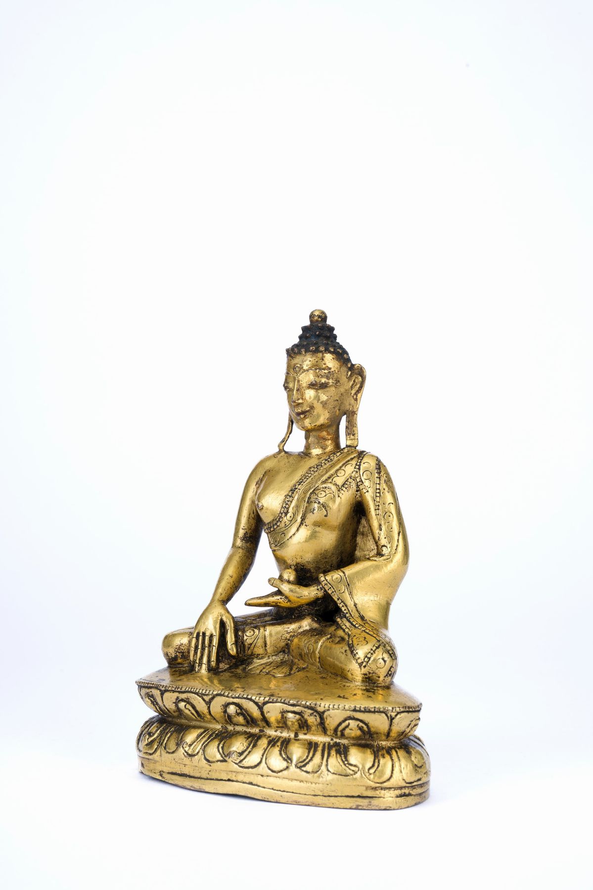 FIGURA DI SHAKYAMUNI IN BRONZO DORATO