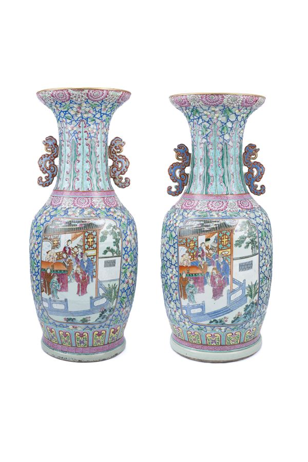 TWO RARE AND LARGE FAMILLE ROSE BALUSTER SHAPED VASES