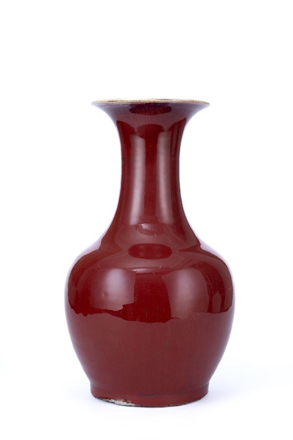 A SANG-DE-BOEUF PORCELAIN VASE