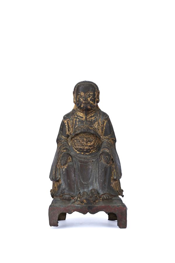 A GILT BRONZE FIGURE