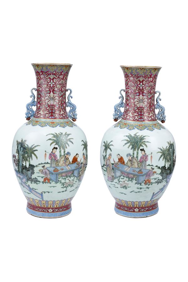 A PAIR OF LARGE FAMILLE ROSE BALUSTER-SHAPED PORCELAIN VASES