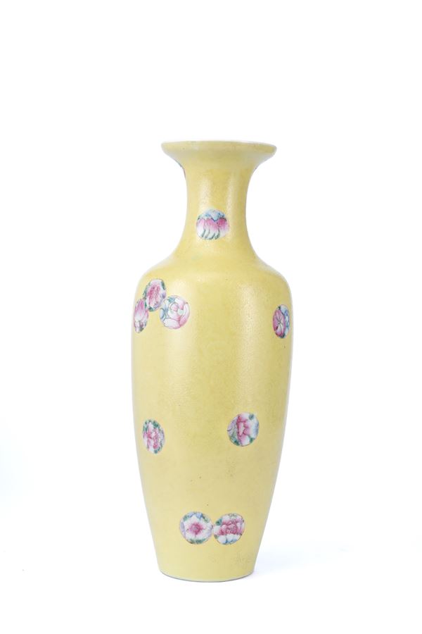 A YELLOW-GROUND SGRAFFITO PORCELAIN VASE