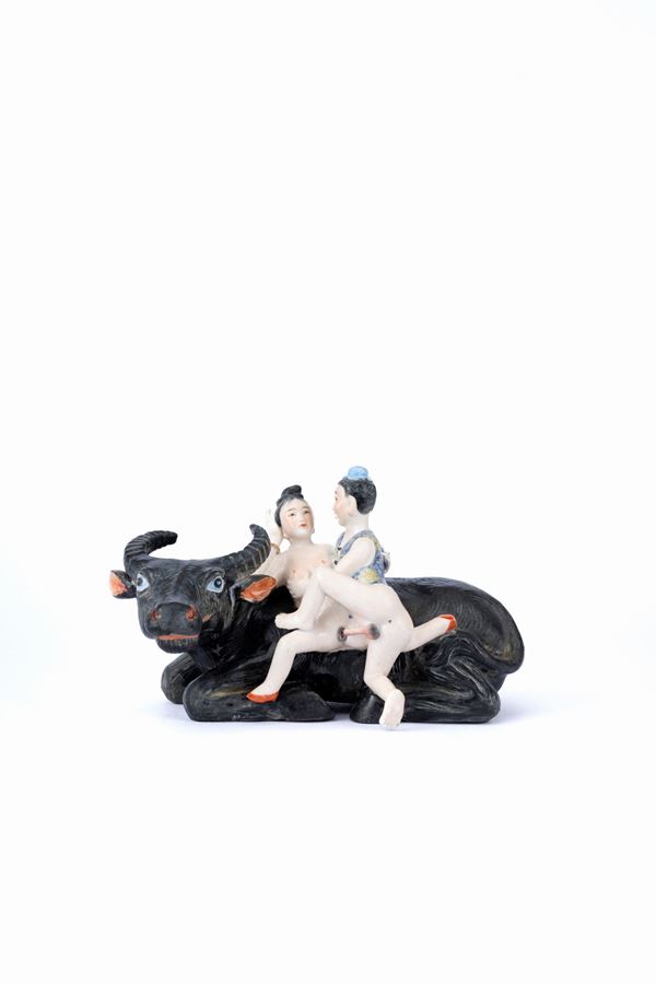 AN EROTIC PORCELAIN FIGURE