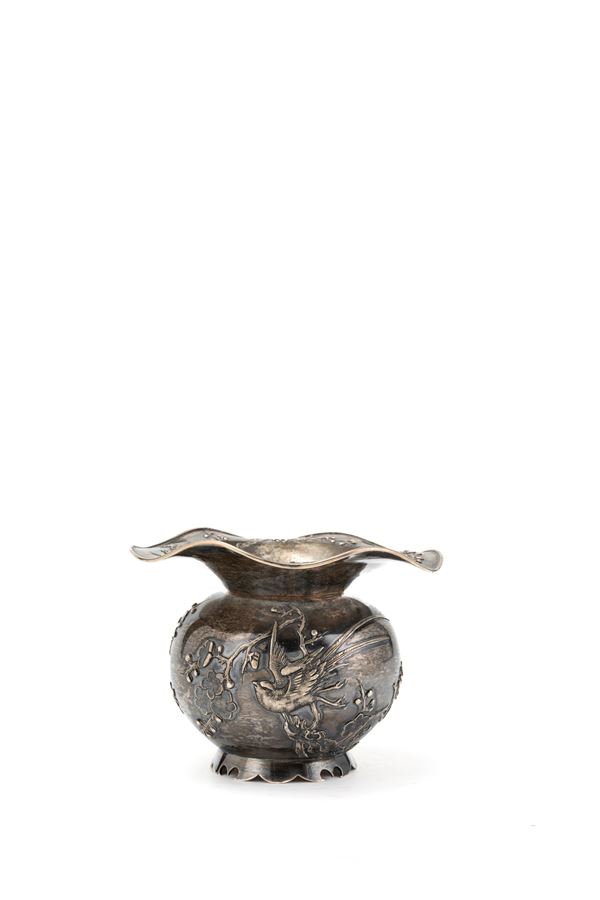 A SILVER VASE