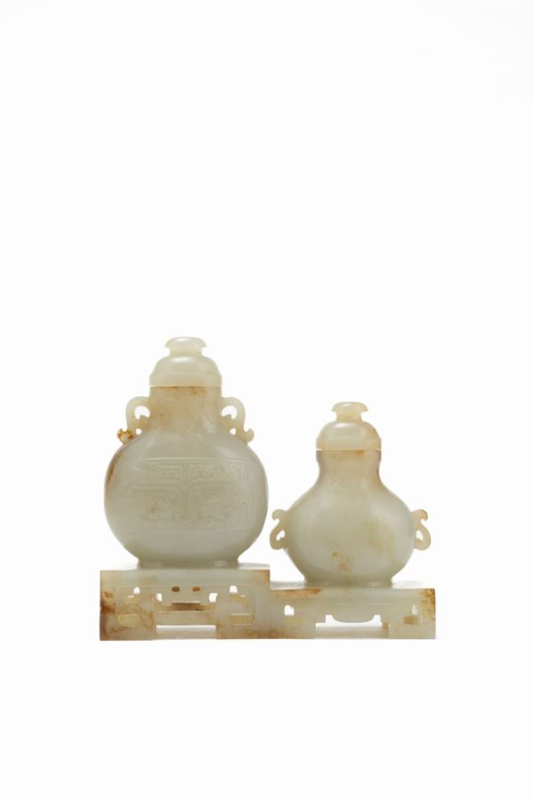 A CELADON AND RUSSET JADE CARVING