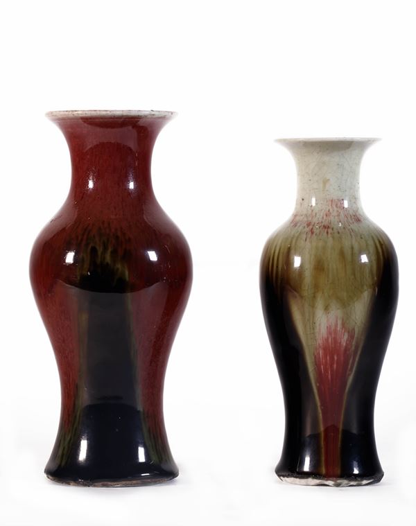 TWO FLAMBÉ BALUSTER-SHAPED PORCELAIN VASES