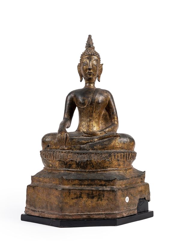 A LARGE GILT-BRONZE FIGURE OF SAKYAMUNI