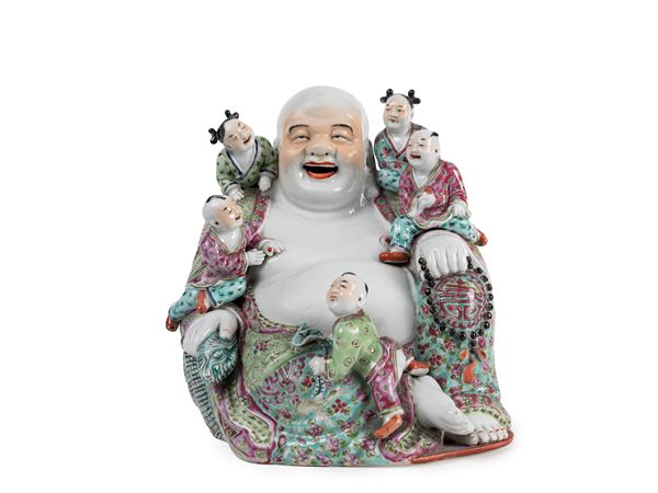 A FAMILLE ROSE PORCELAIN STATUE OF LAUGHING BUDDHA