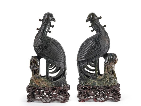 A PAIR OF LARGE SPINACH-GREEN CARVINGS