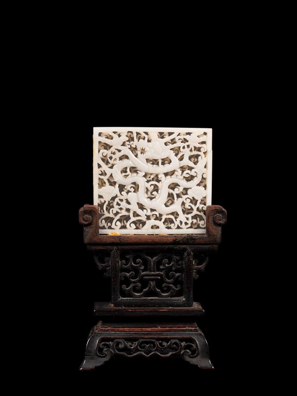 A RETICULATED WHITE JADE 'DRAGON' BELT PLAQUE