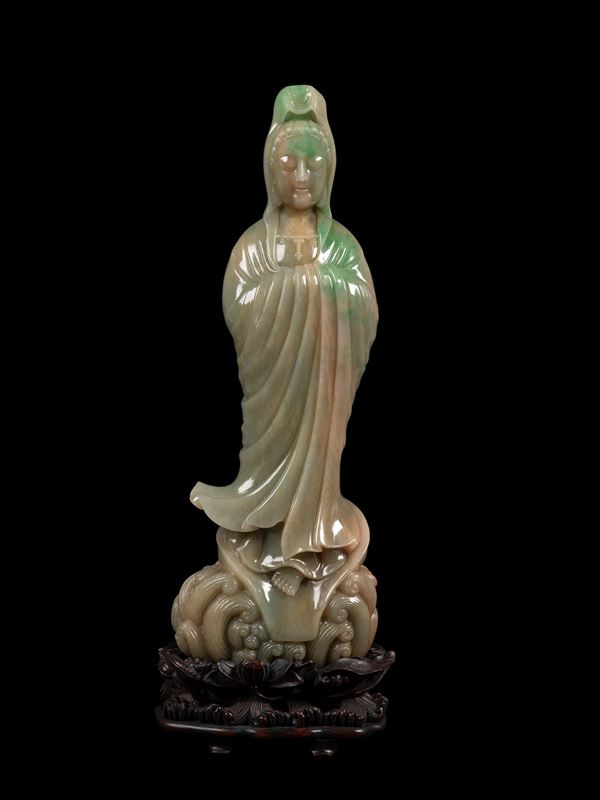 A LARGE JADEITE FIGURE OF GUANYING