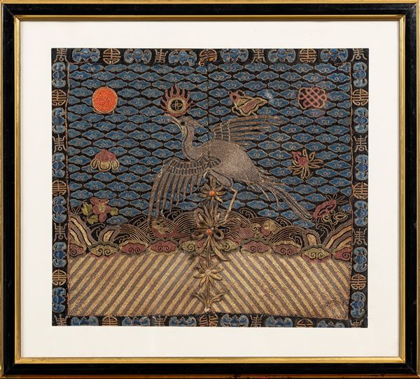AN EMBROIDERY SILK RANK BADGE IN FRAME