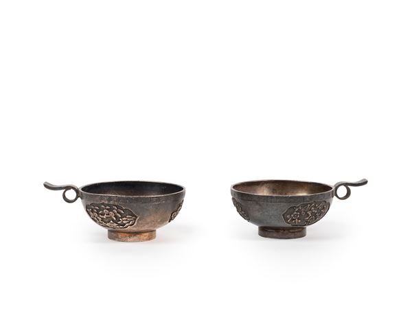 TWO SMALL SILVER CUPS