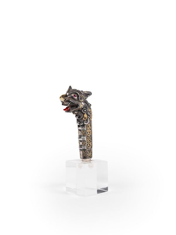 CEREMONIAL DAGGER HANDLE IN REPOUSSÉ AND GILDED SILVER