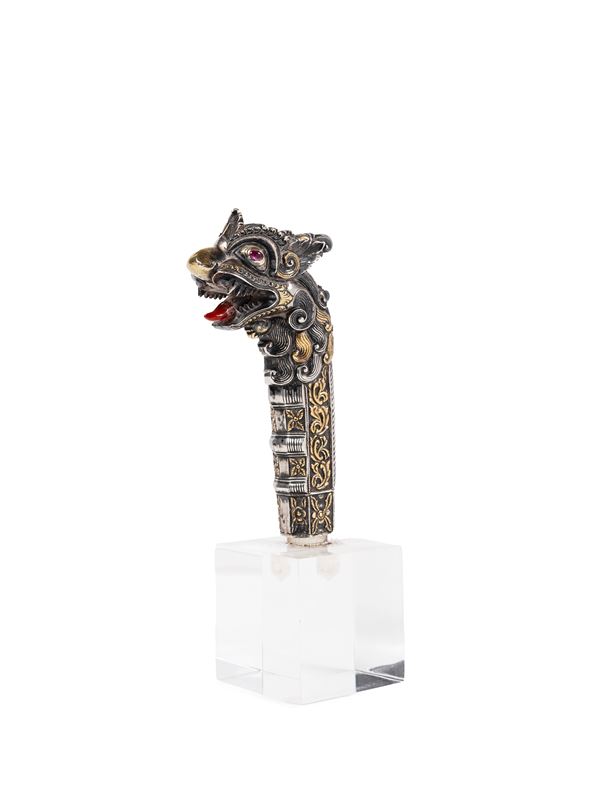 CEREMONIAL DAGGER HANDLE IN REPOUSSÉ AND GILDED SILVER