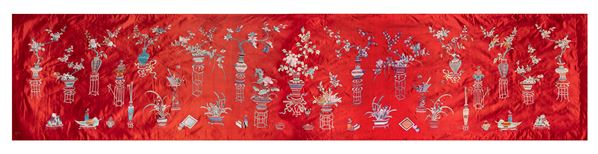 AN EMBROIDERED SILK 
