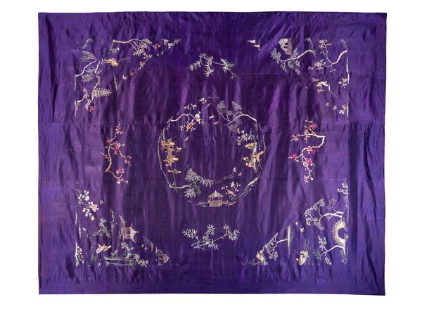 AN EMBROIDERED SILK 