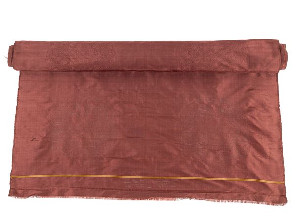A BROWN SILK BROCADE