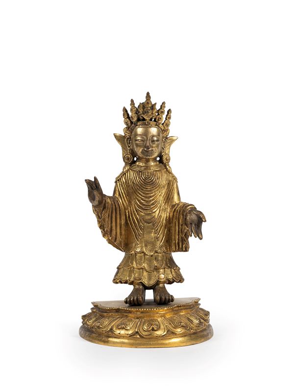 A GILT-BRONZE FIGURE OF UDAYANA BUDDHA