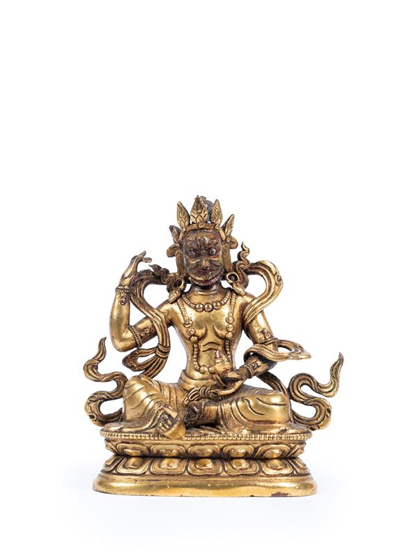 A GILT-BRONZE FIGURE 