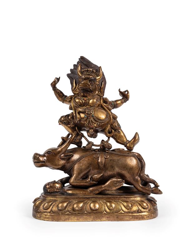 A GILT-BRONZE FIGURE OF YAMA DHARMARAJA