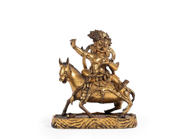 A GILT BRONZE FIGURE OF PALDEN LHAMO