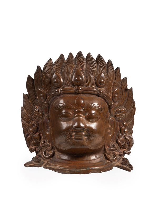 A REPOUSSÉ COPPER HEAD