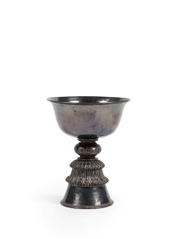 A SILVER BUTTER LAMP