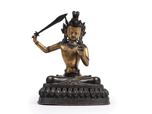 A LARGE GILT-BRONZE FIGURE OF MANJUSHRI