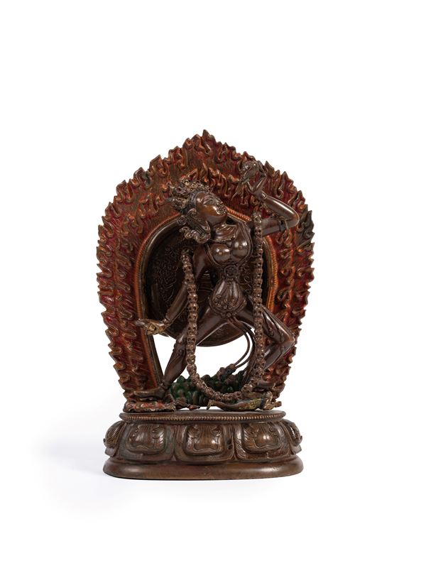 A GILT-BRONZE AND POLYCROME FIGURE OF VAJRAYOGINI