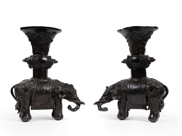 A PAIR OF BRONZE ELEPHANTS